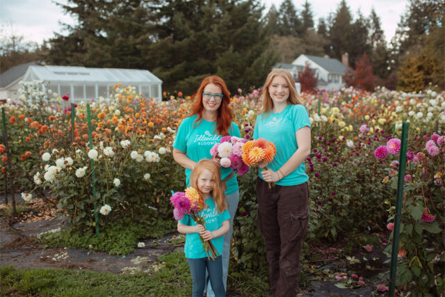 Emily Fontes and her daughters in the dahlia patch at Idlewild Blooms.