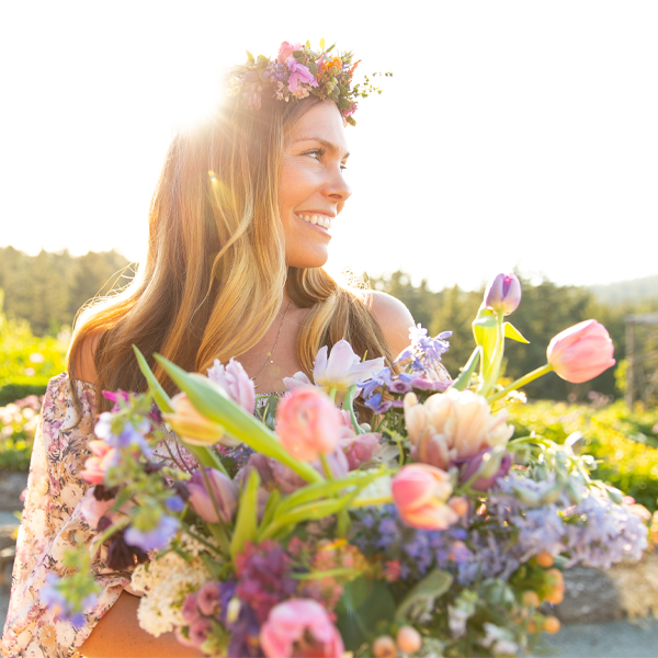 Helen Noran holding a bouquet